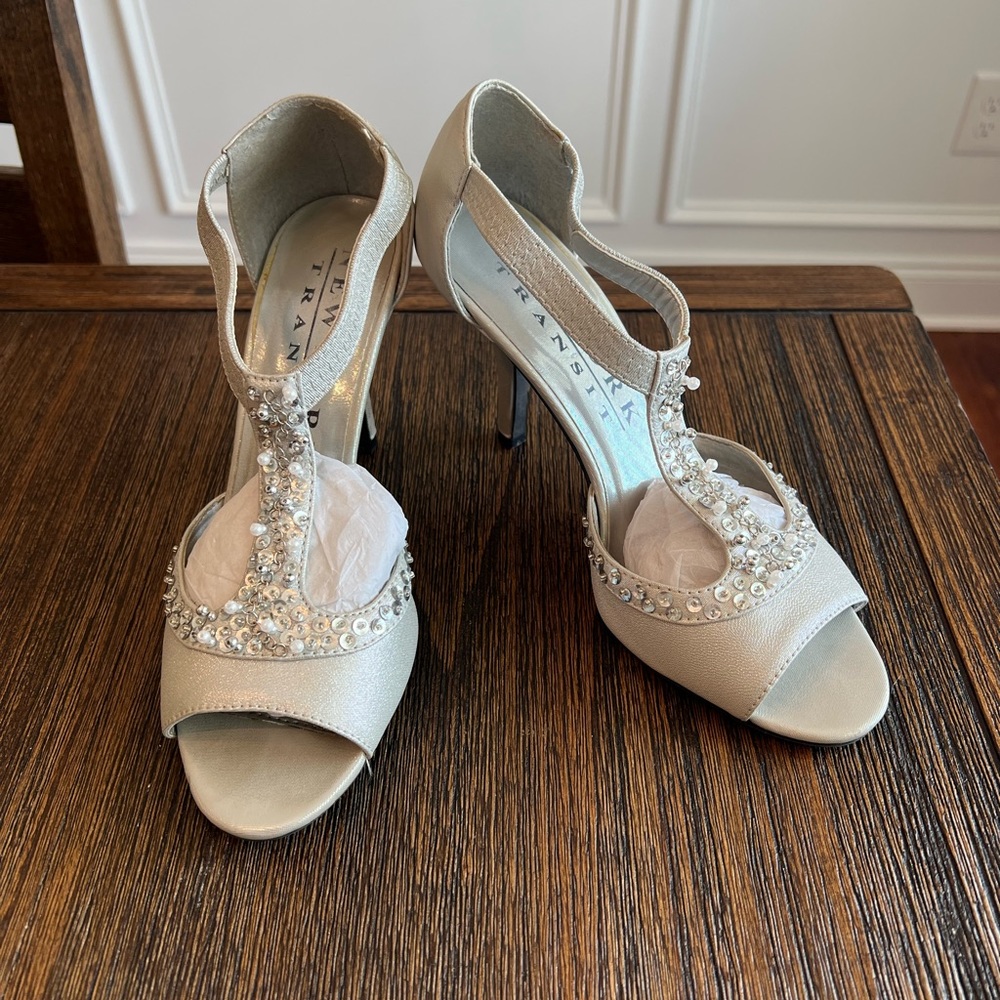New York Transit silver heels. Worn once. Size 7